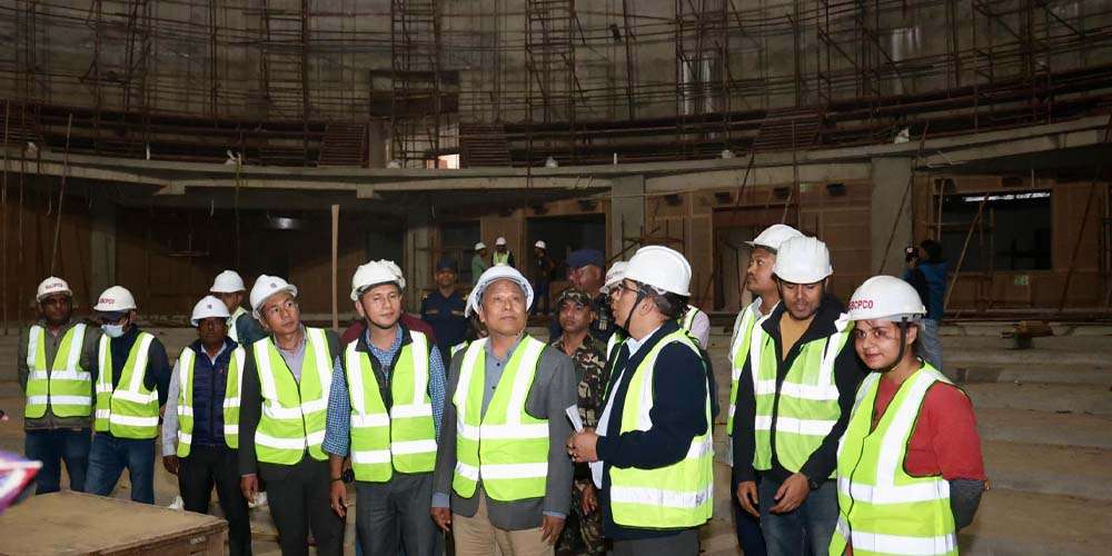 निर्माणाधीन संसद् भवन निर्धारित समयमै सम्पन्न गर्न मन्त्री घिसिङको निर्देशन images